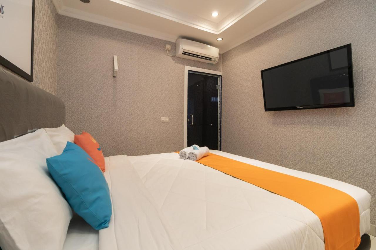 Sans Hotel Beauty Palembang Exterior foto